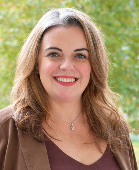 Woman smiling, Looking at camera.